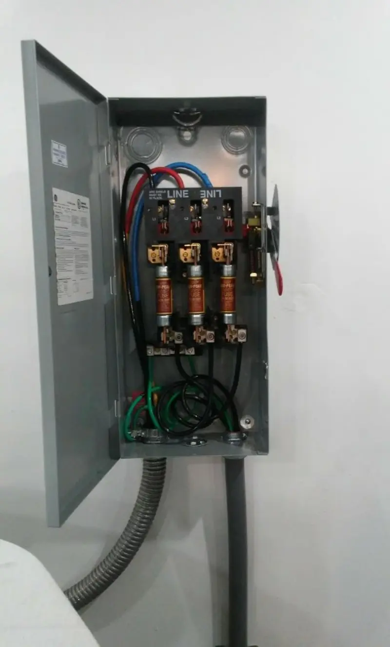 Three-phase disconnect switch installed for Smoke Detector Installation in Carolina Shores